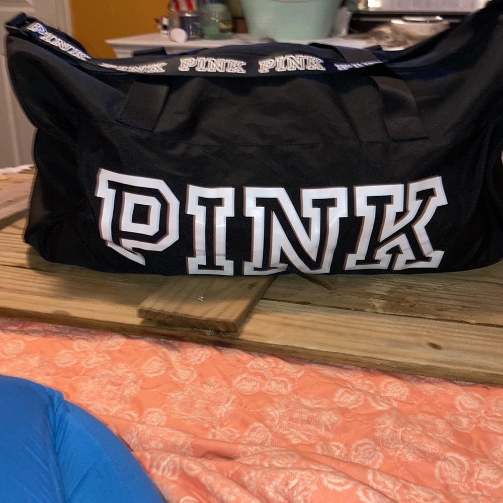 PINK large black and white duffel bag